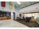 Stunning lobby with artwork, front desk, comfortable seating, and city views at 711 Cosmopolitan Ne Dr # 715, Atlanta, GA 30324