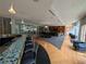 Relaxing lounge area with a wet bar and piano adjacent to more seating at 711 Cosmopolitan Ne Dr # 715, Atlanta, GA 30324