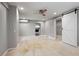 Bedroom featuring a closet with a barn door, carpet, and a ceiling fan at 3207 Bobbie Ln, Decatur, GA 30032