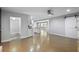 Open concept living room with hardwood floors, recessed lighting, and access to the kitchen area at 3207 Bobbie Ln, Decatur, GA 30032