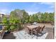 Spacious deck featuring outdoor dining and beautiful backyard views, perfect for relaxing at 3295 Millwood Se Trl, Smyrna, GA 30080