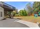 Expansive backyard featuring a play set and lush landscaping, ideal for Gathering fun and relaxation at 3295 Millwood Se Trl, Smyrna, GA 30080