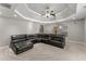 Finished basement boasts large leather sectional, recessed lighting, and open access to playroom at 3295 Millwood Se Trl, Smyrna, GA 30080