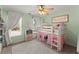 Charming ' bedroom with whimsical decor, playful bunk bed, and soft natural light creating a cozy atmosphere at 3295 Millwood Se Trl, Smyrna, GA 30080
