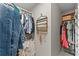 Spacious walk-in closet with custom shelving and ample storage for organizing clothes and accessories at 3295 Millwood Se Trl, Smyrna, GA 30080
