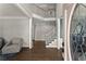 Grand foyer with hardwood floors, a staircase, and natural light at 3295 Millwood Se Trl, Smyrna, GA 30080