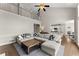 Spacious living room with vaulted ceiling, hardwood floors, and an open floor plan at 3295 Millwood Se Trl, Smyrna, GA 30080
