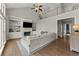 Inviting living room with vaulted ceiling, fireplace, built-ins, and comfortable seating at 3295 Millwood Se Trl, Smyrna, GA 30080