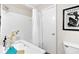 Bathroom showcasing vanity with a white countertop and a shower with white subway tiles at 3982 Battleford Ct, Atlanta, GA 30341