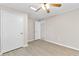 Bedroom featuring updated lighting, flooring, neutral paint and standard closet with white door at 3982 Battleford Ct, Atlanta, GA 30341