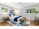 Cozy bedroom with hardwood floors, windows, and modern decor at 3982 Battleford Ct, Atlanta, GA 30341