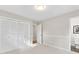 Bedroom features a closet, bathroom, neutral walls, and carpet flooring at 3982 Battleford Ct, Atlanta, GA 30341