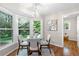 Breakfast nook with a bay window, hardwood floors, and plenty of natural light at 3982 Battleford Ct, Atlanta, GA 30341