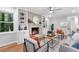 Inviting living room with decorative fireplace, hardwood floors, and built-in shelving at 3982 Battleford Ct, Atlanta, GA 30341