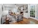 Bright living room with fireplace, hardwood floors, and access to the backyard at 3982 Battleford Ct, Atlanta, GA 30341
