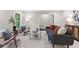 Bright living room with neutral paint, modern furniture, and plush white carpeting at 3982 Battleford Ct, Atlanta, GA 30341
