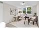 Bright office featuring a window, neutral walls, and laminate flooring at 3982 Battleford Ct, Atlanta, GA 30341