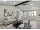 Bright living room features natural light, modern furniture, and neutral colors at 4983 Needle Knob Ct, Lithonia, GA 30038