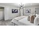 Spacious bedroom with bright, natural light with large closets and stylish lighting at 4983 Needle Knob Ct, Lithonia, GA 30038