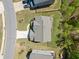 An aerial shot of a home showcases its fenced backyard and proximity to the road at 5780 Winding Lakes Dr, Cumming, GA 30028