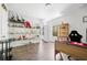 Bright home office with desk and shelves displaying model ships and buildings at 5780 Winding Lakes Dr, Cumming, GA 30028
