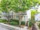 Beautiful home with a stone facade, landscaped garden, and charming front porch at 2238 Parkview Nw Ct, Atlanta, GA 30318