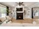 Inviting living room with a fireplace, hardwood floors, built-in shelving and natural light at 2238 Parkview Nw Ct, Atlanta, GA 30318