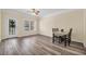 Dining room showcasing laminate floors, natural light, and neutral paint at 2700 Pine Tree Ne Rd # 1015, Atlanta, GA 30324