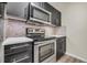 Updated kitchen featuring stainless steel appliances and sleek, modern cabinetry for ample storage at 2700 Pine Tree Ne Rd # 1015, Atlanta, GA 30324