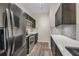 Modern kitchen with stainless steel appliances, and sleek dark cabinetry at 2700 Pine Tree Ne Rd # 1015, Atlanta, GA 30324