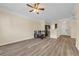 Open-concept living room featuring laminate flooring and neutral paint at 2700 Pine Tree Ne Rd # 1015, Atlanta, GA 30324