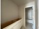 Bathroom with unfinished cabinetry and an open doorway leading to the shower at 4556 Sweetlake Sw Ct, Mableton, GA 30126