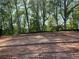 Beautiful empty lot ready for new construction located in a serene area with mature trees and space for outdoor activities at 4556 Sweetlake Sw Ct, Mableton, GA 30126