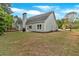Home exterior with a well-manicured lawn and a glimpse of backyard amenities at 17 Brightwater Cv, Dallas, GA 30157