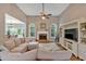 Bright living room featuring a fireplace, hardwood floors, and a cozy atmosphere at 17 Brightwater Cv, Dallas, GA 30157