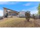 Backyard view features a screened in porch and partially fenced yard at 4531 Claiborne Ct, Duluth, GA 30096