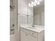 Bright bathroom features a white vanity with a quartz countertop and modern fixtures at 4531 Claiborne Ct, Duluth, GA 30096
