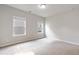 Bright bedroom with neutral paint colors and 2 bright windows looking out to the neighborhood at 4531 Claiborne Ct, Duluth, GA 30096