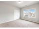 Bedroom with neutral paint colors, 2 bright windows looking out to the neighborhood, and closet at 4531 Claiborne Ct, Duluth, GA 30096