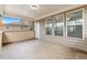 Enclosed back patio with neutral walls, and a ceiling fan at 4531 Claiborne Ct, Duluth, GA 30096