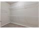 A large walk-in closet featuring wire shelving for customizable storage at 4531 Claiborne Ct, Duluth, GA 30096