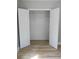 Open closet with shelving and hardwood floors in the bedroom at 6881 Homestead Rd, Rex, GA 30273