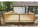 Newly constructed wood deck off the back of the house is perfect for entertaining or relaxing outdoors at 6881 Homestead Rd, Rex, GA 30273