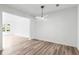 Open concept living room with new floors and modern lighting at 197 Holcomb Ferry Rd, Roswell, GA 30076