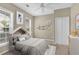 bedroom features custom bed, windows, carpet, and closet at 3401 Ravensworth Trce, Kennesaw, GA 30144