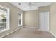 This bright bedroom features two large windows and ample closet space at 3401 Ravensworth Trce, Kennesaw, GA 30144