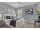 Relaxing bedroom boasts a cozy atmosphere with natural light and contemporary decor at 3401 Ravensworth Trce, Kennesaw, GA 30144