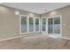 Dining area bathed in natural light, offering sliding glass door and backyard views at 3401 Ravensworth Trce, Kennesaw, GA 30144