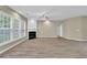 Spacious living area with a fireplace, recessed lighting and multiple windows providing tons of natural light at 3401 Ravensworth Trce, Kennesaw, GA 30144