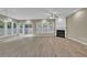 Bright living room featuring a fireplace, recessed lighting, and sliding glass doors leading to backyard at 3401 Ravensworth Trce, Kennesaw, GA 30144